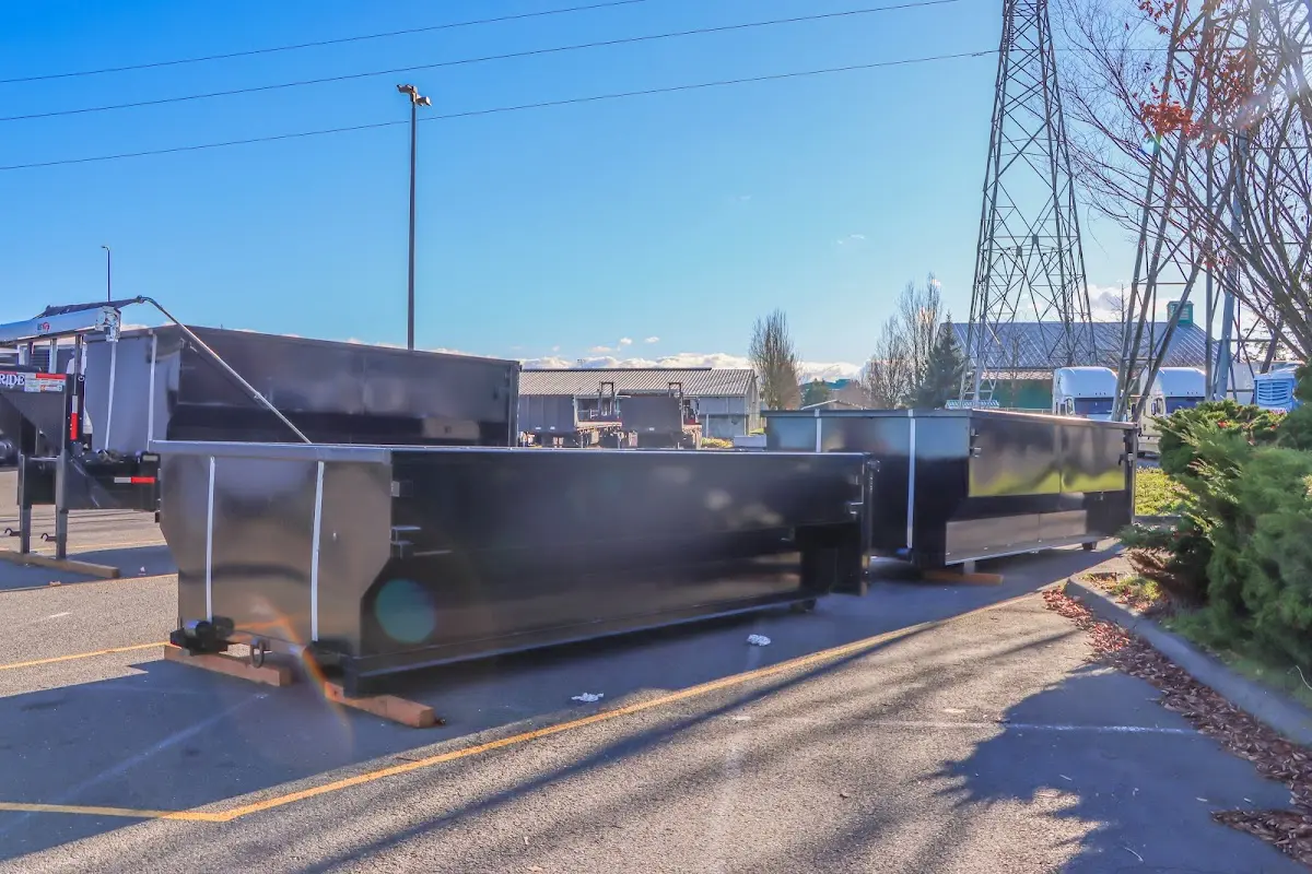 Roll-off dumpster ready for waste disposal at job site for Construction Dumpster Rental in Forest City